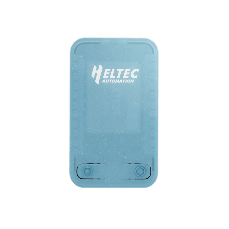 Heltec RadioCore RC32 front view showing translucent faceplate and two control buttons